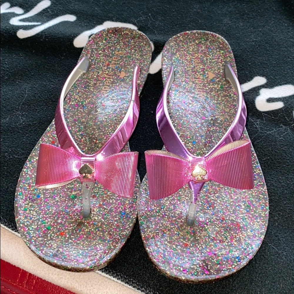 Kate Spade- Size 6 , gently worn Pink flipflop